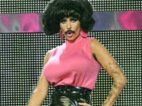 Katie Price dons fake moustache for Comic Relief