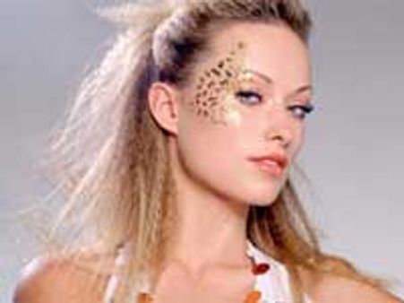 Olivia Wilde goes topless for Cowboys and Aliens