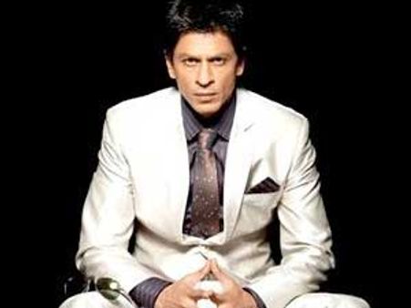 Shahrukh wants a piece of Aamir's director