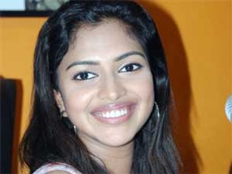 Amala Paul playing the heroine in Indian Rupee