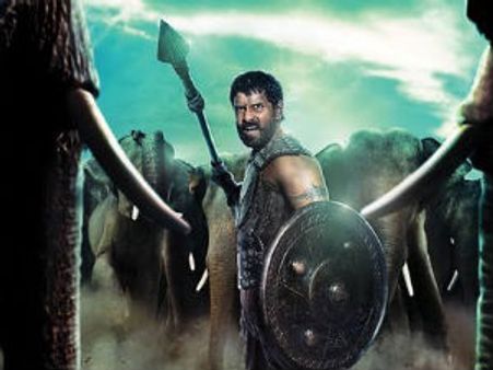 Who's written script for Vikram's Karikalan?