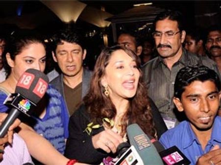 Madhuri Dixit Nene returns to Mumbai with family