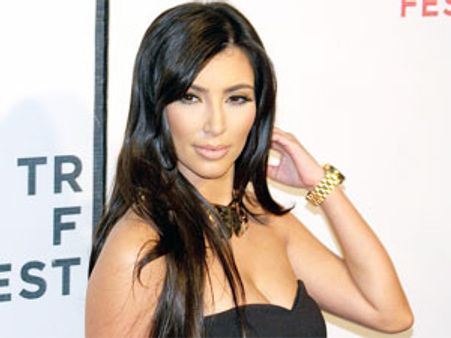 Kim Kardashian goes topless for new Denim Ad