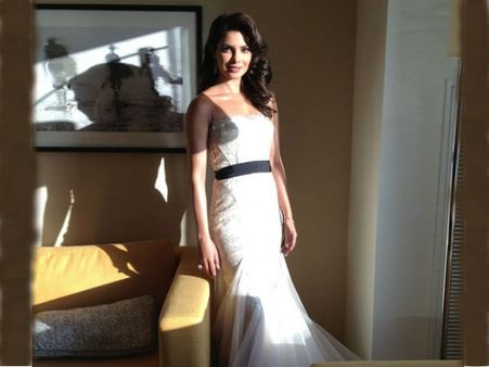 Priyanka Chopra walks Grammys red carpet in white gown