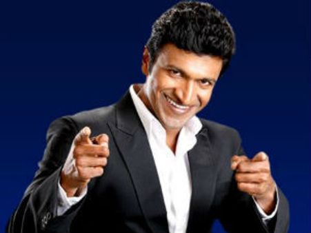 What Puneet Rajkumar calls his computer in Kannadada Kotyadhipati?