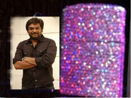 Ganesh Babu gifts diamond lighter to Puri Jagannath