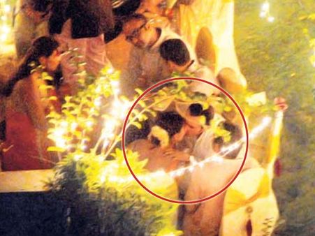 PICTURE: Saif Ali Khan smooches Kareena in public!