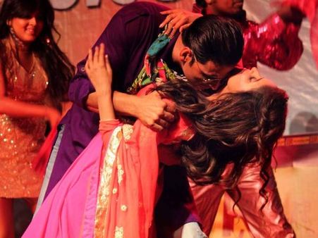 SEE PICTURE: When Akshay grabbed Asin and kissed on her neck!