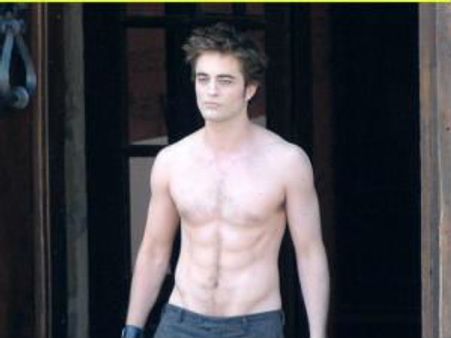 Robert Pattinson topless with three women in ad