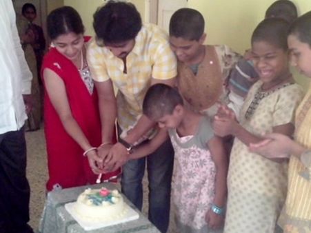 Photos: Prem Kumar adopts two children on his 37th birthday