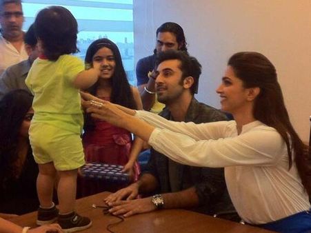 Cute Pic: Ranbir-Deepika spotted cuddling a baby at YJHD promotions