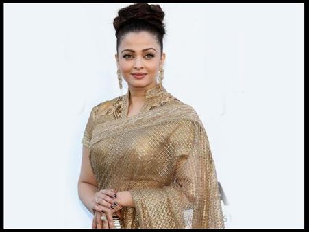 Pictures: Aishwarya Rai Bachchan wears golden saree at Cannes