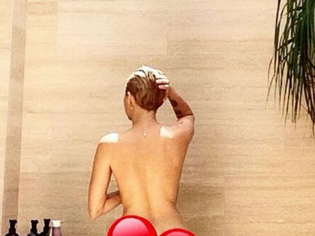 Guess Who? It's None Other Than Miley Cyrus Taking Shower