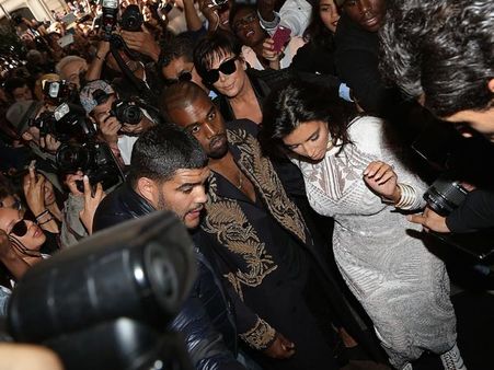 Watch: Kim Kardashian Attacked By Prankster At Paris Fashion Week