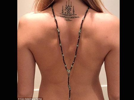 Cara Delevingne Goes Topless, Posts Photo Online