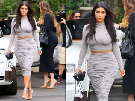 Kim Kardashian Goes Braless, Shows Off Abs