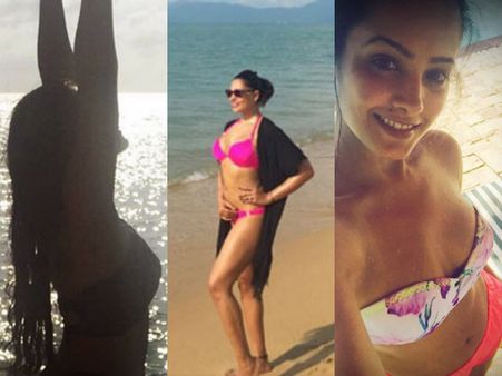 HOT Bikini Pics: Sonakshi Sinha, Sonam Kapoor & Bipasha Basu Ring In The New Year On The Beach!