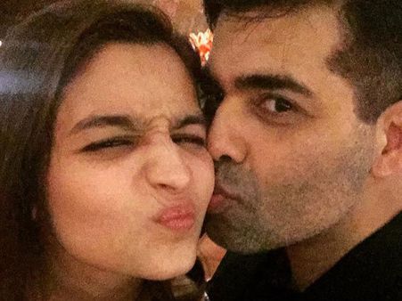 Alia Bhatt Hugs & Kisses Karan Johar's New Family Member!