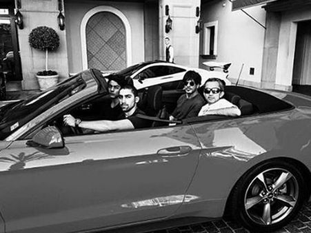 KILLER! Shahrukh Khan & Aryan Khan Spotted Riding A Swanky Car; Their New Picture Is Oozing Hotness!