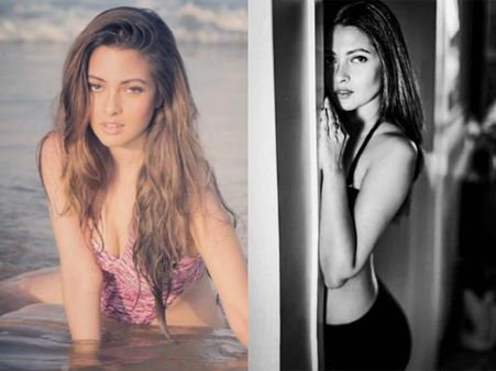 HOT Pictures! Riya Sen Plays Peek-A-Boo With Her Fans!