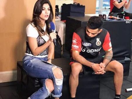 Virat Kohli Staring At Archana Vijaya's Legs Goes Viral! But Is He Really Staring At Her Legs?