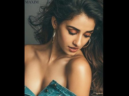 EYE-POPPING! Disha Patani UNBUTTONS Her Shirt; Looks UNBEARABLY HOT In Her Latest Picture