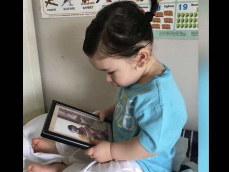 HE'S THE CUTEST! A Pony-Tailed Taimur Gazing At His Dad Saif's Photo Will Melt Your Heart Right Away