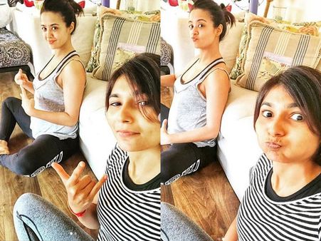 Surveen Chawla Flaunts Her Baby Bump While Performing Yoga!