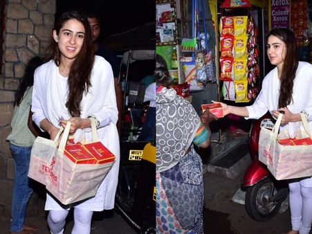 Sara Ali Khan Distributes Sweets Outside Temple; Mum Amrita Singh Accompanies Her