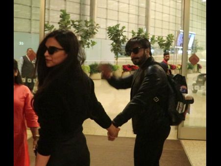 Deepika Padukone Is All Smiles; Walks Hand In Hand With Ranveer At Airport!