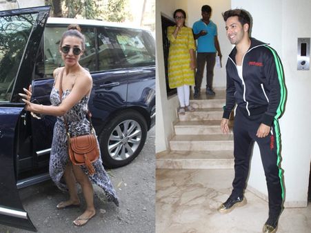 Malaika Arora Dressed For Summer In A Pretty Maxi Dress; Varun Dhawan Strikes A Pose For Cameras