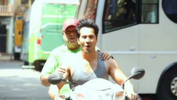 Varun Dhawan Retorts Sarcastically When A Troller Calls Him Out For Riding A Scooter Without Helmet