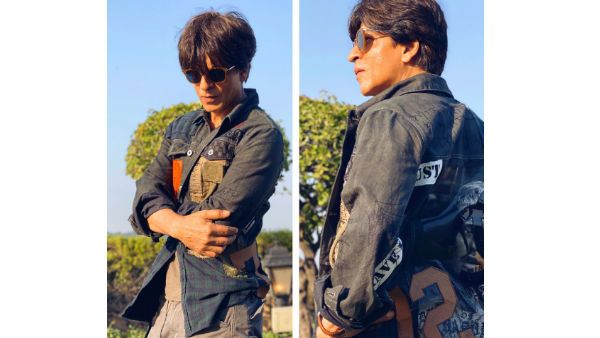 Shah Rukh Khan Flaunts A Jacket Gifted By Karan Johar, Hilariously Demands A Pair Of Heels!