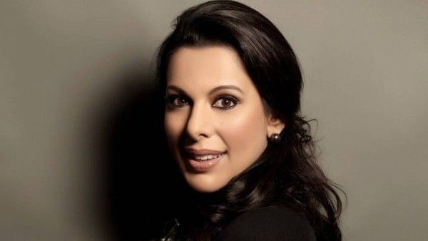 Pooja Bedi Calls Vaccination 'Illogical & Sinister'; Asks How Can A Universal Pass Be Valid For Two Jabs?