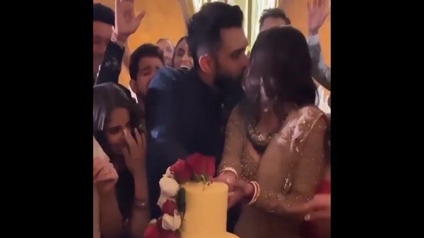 Mouni Roy And Her Husband Suraj Nambiar Kiss Each Other Passionately At Their Reception Party (VIDEO)