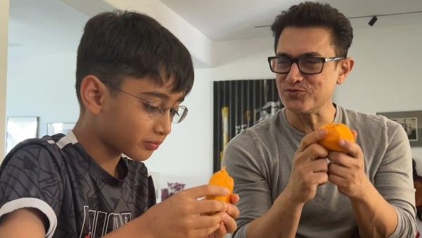Aamir Khan And Son Azad Enjoy A Mango Binge