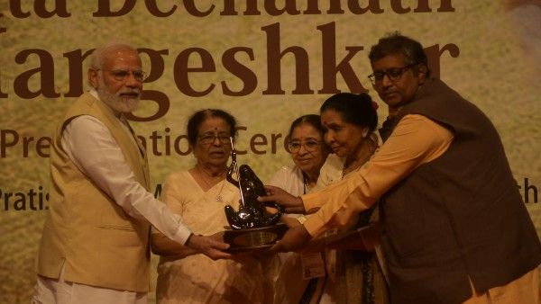 Prime Minister Narendra Modi Receives The First Lata Deenanath Mangeshkar Award At A Ceremony In Mumbai