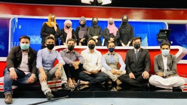 Afghan Male TV Anchors Cover Faces In Support Of Female Colleagues Following The Taliban Order