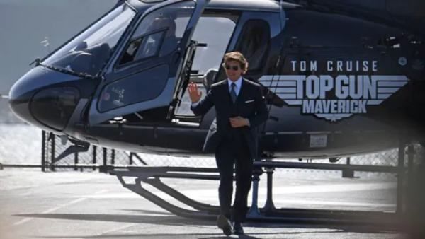 Tom Cruise Arrives In A Helicopter For Top Gun: Maverick Movie Premiere