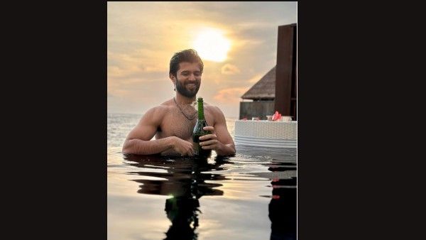 Vijay Deverakonda’s Shirtless Pool Photo On New Year Was Taken By Rashmika Mandanna?