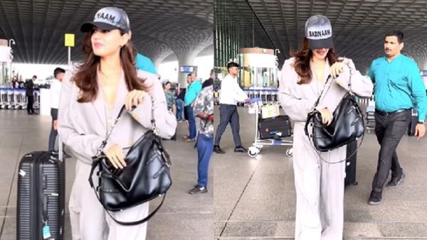 Rhea Chakraborty Makes A Strong Fashion Statement With Her 'BADNAAM' Cap! Check Out!