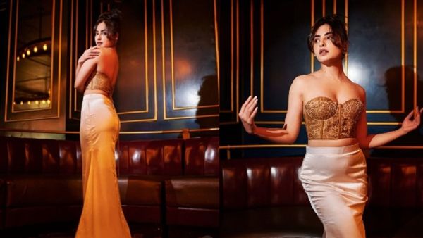 Actress Niyati Fatnani Is Beauty To Behold In An Off-Shoulder Golden Top And White Satin Skirt- VIRAL PICS