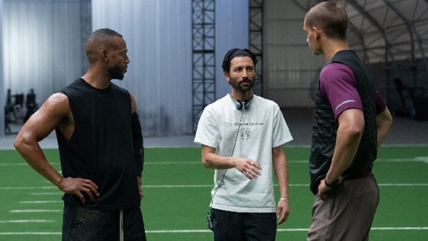 Director Justin Tipping On HIM As A Critique Of Mass-Market Sports Culture: 