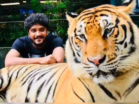 ಹುಲಿ ಜೊತೆ ಕುಳಿತು ಫೋಟೋಗೆ ಪೋಸ್ ನೀಡಿದ ಸ್ಯಾಂಡಲ್ ವುಡ್ ಸಿಂಹ