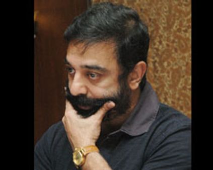 கமலுக்கு கருணாநிதி தந்த முத்தம்!