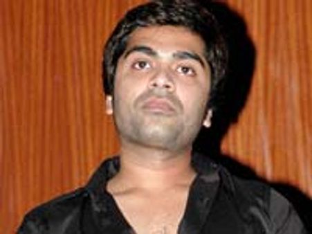 அதிகாலை 4.30 மணிக்கு விசிலடித்து எந்திரன் பார்த்த சிம்பு!