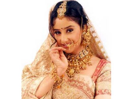 போதைக்கு பை... கோயில் கோயிலாக சுற்றும் மனீஷா கொய்ராலா!