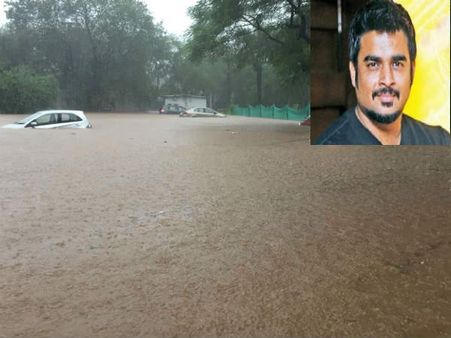 மும்பை வெள்ளத்தில் சிக்கிய கார்... இடுப்பளவு வெள்ளத்தில் நடந்து சென்ற மாதவன்! #MumbaiFloods