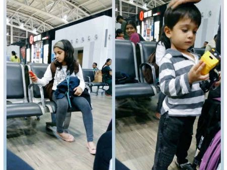 விமான நிலையத்தில் அனௌஷ்கா, குட்டி தல: வைரலான போட்டோ