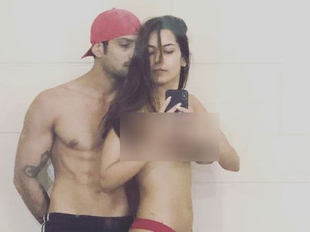 காதல் மனைவியின் டாப்லெஸ் போட்டோவை வெளியிட்ட நடிகர்: துப்பும் நெட்டிசன்ஸ்